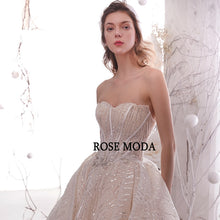Load image into Gallery viewer, RoseModaLuxuryGlitteringWeddingDresswithLongTrainRemovableBowPrincessBallGownCustomMake-c.jpg