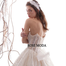 Load image into Gallery viewer, RoseModaLuxuryGlitteringWeddingDresswithLongTrainRemovableBowPrincessBallGownCustomMake-d.jpg