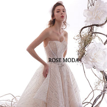 Load image into Gallery viewer, RoseModaLuxuryGlitteringWeddingDresswithLongTrainRemovableBowPrincessBallGownCustomMake-f.jpg