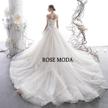 Load image into Gallery viewer, RoseModaLuxuryOfftheShoulderFrenchLaceWeddingDressIvoryandChampagnePrincessBallGownLongTrain-c.jpg