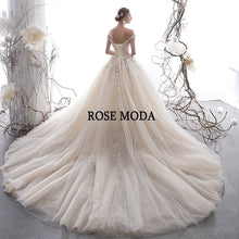Load image into Gallery viewer, RoseModaLuxuryOfftheShoulderIvoryandChampagneLaceWeddingDresswithLongTrainCustomMake-c.jpg
