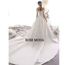 Load image into Gallery viewer, RoseModaSimpleOfftheShoulderSatinWeddingDresswithLongTrainLaceUpBackCustomMake-c.jpg