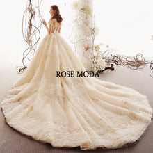 Load image into Gallery viewer, RosemodaLuxuryIvoryandGoldLaceWeddingDressLongTrainGlitteringPrincessWeddingBallGown-b.jpg