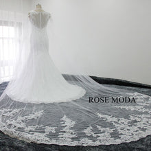 Load image into Gallery viewer, rosemoda-beaded-lace-mermaid-wedding-dress-with-detachable-cape-h.jpg