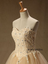 Load image into Gallery viewer, rosemoda-champagne-lace-ball-gown-wedding-dress-with-long-veil-f.jpg