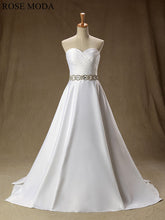 Load image into Gallery viewer, rosemoda-elegant-satin-a-line-wedding-dress-with-crystal-belt-a.jpg