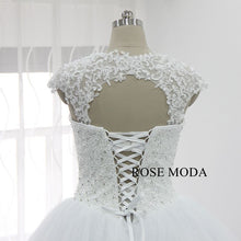 Load image into Gallery viewer, rosemoda-heavy-beaded-ball-gown-wedding-dress-with-detachable-lace-bolero-f.jpg