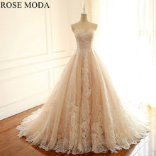 Load image into Gallery viewer, rosemoda-ivory-over-blush-lace-ball-gown-wedding-dress-a.jpg