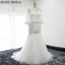 Load image into Gallery viewer, rosemoda-lace-mermaid-wedding-dress-with-removable-cape-a.jpg