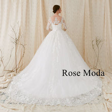 Load image into Gallery viewer, Rosemoda Nude Bateau Illusion Neckline Ball Gown Wedding Dress With Long Sleeve