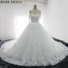 Load image into Gallery viewer, rosemoda-off-the-shoulder-3D-lace-ball-gown-wedding-dress-with-royal-train-a.jpg