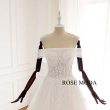 Load image into Gallery viewer, rosemoda-off-the-shoulder-illusion-a-line-wedding-dress-d.jpg