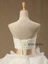Load image into Gallery viewer, rosemoda-ruffled-organza-ball-gown-wedding-dress-with-crystal-belt-f.jpg