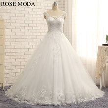 Load image into Gallery viewer, rosemoda-sheer-cap-sleeve-dropped-a-line-wedding-dress-a.jpg