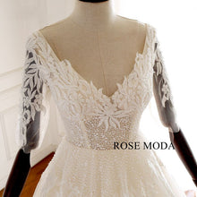 Load image into Gallery viewer, rosemoda-half-sleeve-illusion-beaded-lace-ball-gown-wedding-dress-d.jpg
