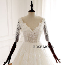 Load image into Gallery viewer, rosemoda-half-sleeve-illusion-beaded-lace-ball-gown-wedding-dress-e.jpg
