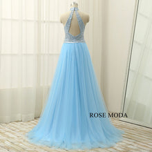 Load image into Gallery viewer, rosemoda-halter-beaded-blue-a-line-prom-dress-c.jpg
