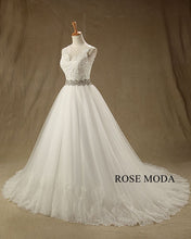 Load image into Gallery viewer, rosemoda-illusion-ball-gown-wedding-dress-with-crystal-belt-b.jpg
