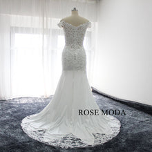 Load image into Gallery viewer, rosemoda-lace-mermaid-wedding-dress-with-cut-out-hem-c.jpg
