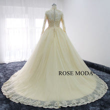 Load image into Gallery viewer, rosemoda-long-sleeve-muslim-champagne-ball-gown-wedding-dress-c.jpg
