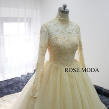 Load image into Gallery viewer, rosemoda-long-sleeve-muslim-champagne-ball-gown-wedding-dress-f.jpg
