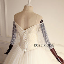 Load image into Gallery viewer, rosemoda-off-the-shoudler-beaded-ball-gown-wedding-dress-g.jpg
