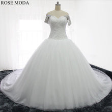 Load image into Gallery viewer, rosemoda-off-the-shoulder-dropped-ball-gown-wedding-dress-a.jpg
