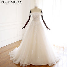 Load image into Gallery viewer, rosemoda-off-the-shoulder-illusion-a-line-wedding-dress-a.jpg
